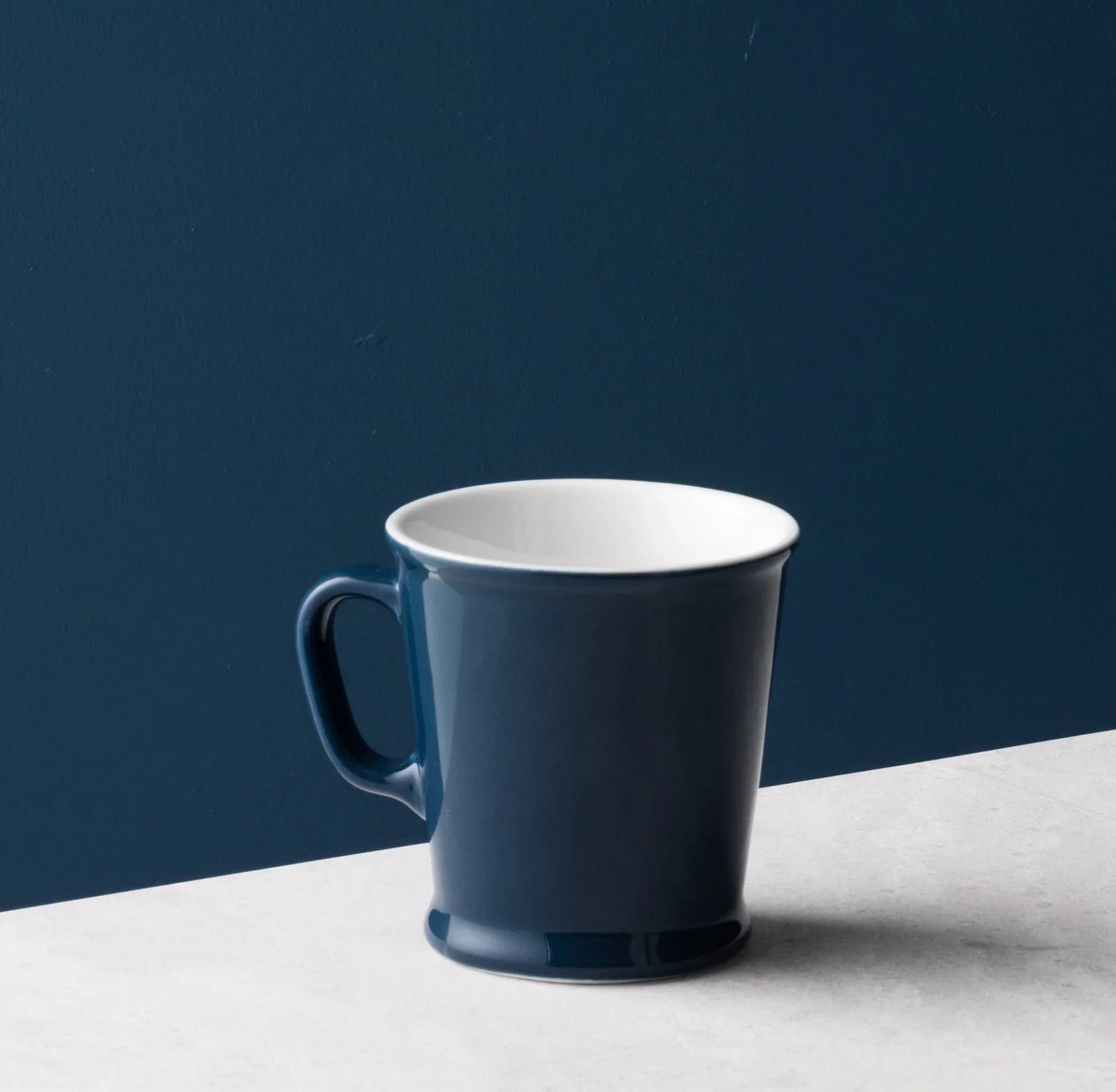 Acme union mug whale on a white surface.